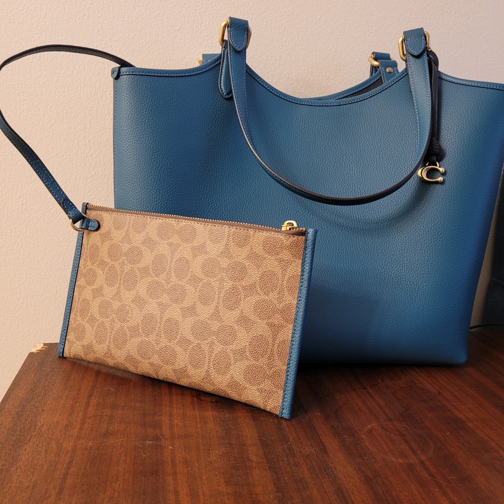 Coach purse with built in wallet/clutch